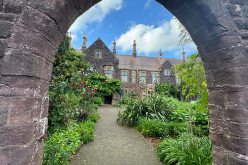 Archway showing big house